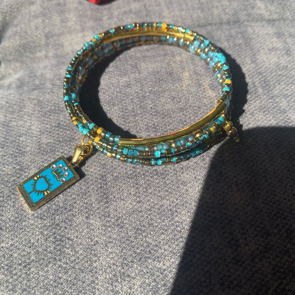 Turquoise and Gold Beaded Bracelet with Sun Charm